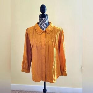 NWOT Womens LC Lauren Conrad Button down longsleeve shirt has an eyelet collar.